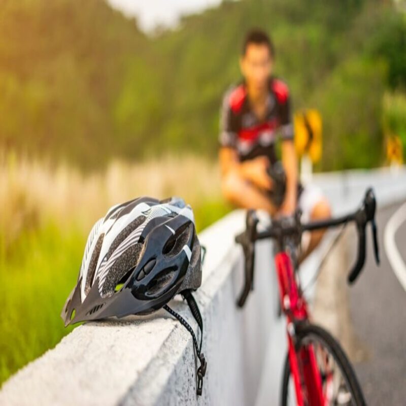 wearing a helmet on a bicycle