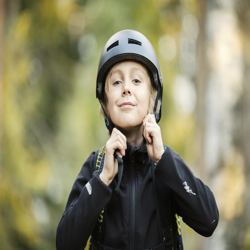 wearing a helmet on a bicycle