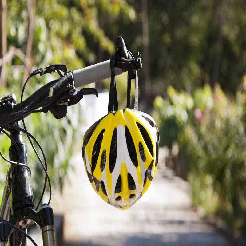 wearing a helmet on a bicycle